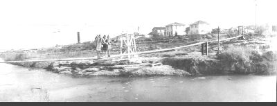 Swinging bridge across Concho River