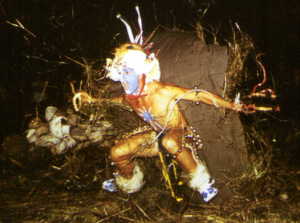 Bob Kamensky jumping out
                from underground at start of campfire at Camp Fawcett.